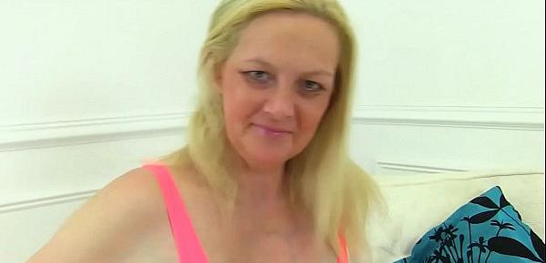  British milf Fiona plays with her boobs and fanny